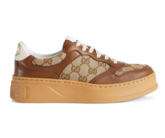 Shop for new Gucci GG embossed low-top sneakers for Women in Ebony-beige at our Outlet!