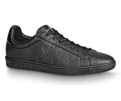 Louis Vuitton Luxembourg Sneaker in Black. Monogram-embossed grained calf leather. Buy men's luxury shoes today!