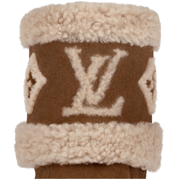 Stand out with the stylish and luxurious Louis Vuitton Snowdrop Flat Ankle Boot Cognac Brown for women!
