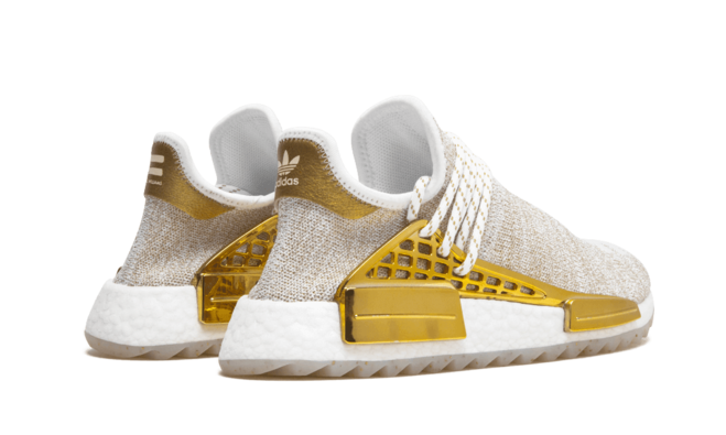 Pharrell Williams' Gold NMD Human Race Holi MC Exclusively from China - Shop Today.