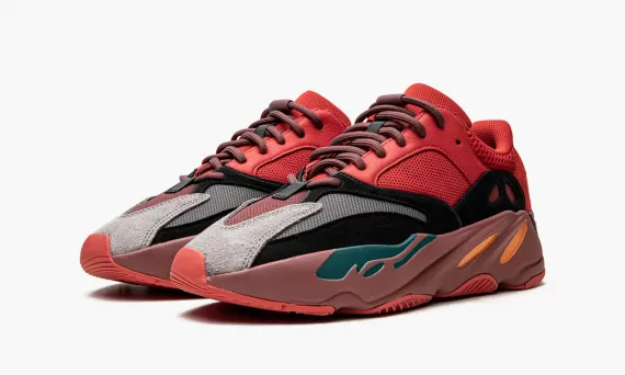 Grab Women's Yeezy Boost 700 - Hi-Res Red: Stand out with vibrant red shoes!