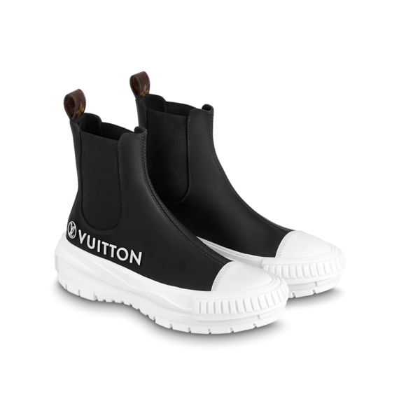 Own the new LV Squad Sneaker Boot for women.