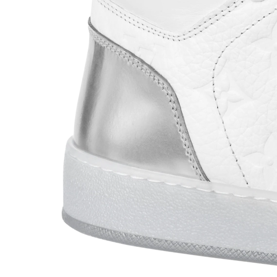 Get the newest Louis Vuitton Rivoli Sneaker Boot White for men.