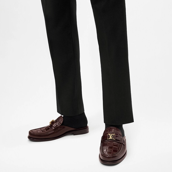 Step up your style with a new, original Louis Vuitton Major open back loafer.