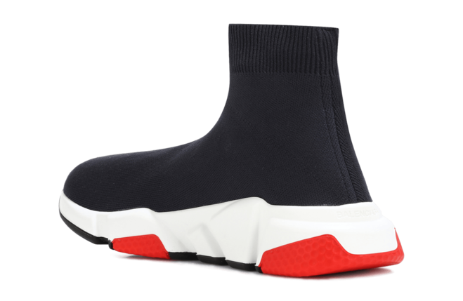 Women kicking it up in Balenciaga Speed Runner MID Black/Red sneakers - Originals