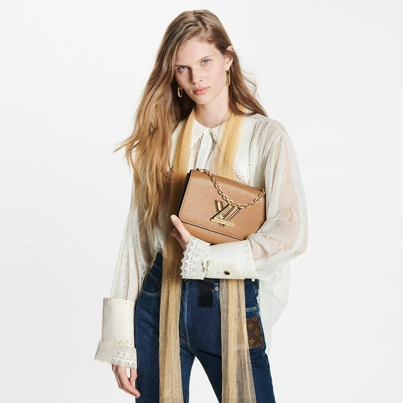 Get the stylish new Louis Vuitton Twist MM Beige Tivoli Epi Women's bag at an outlet near you.
