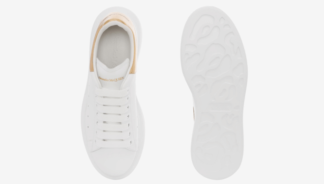 Get the Ladies Alexander McQueen White/Light Gold Oversized Sneakers On Sale