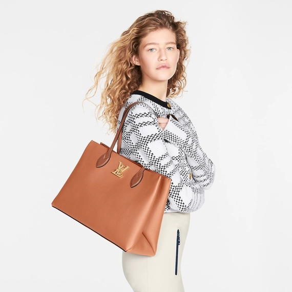 Sale on original Louis Vuitton LockMe Shopper bags - the perfect way to stay stylish.