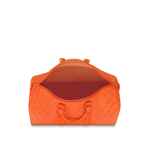 Find the Louis Vuitton Keepall Bandouliere 50 Orange in vibrant orange for the perfect men's bag