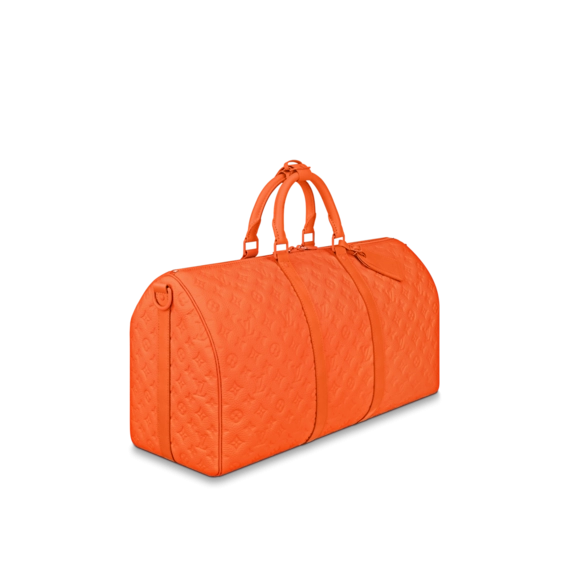 Discover the perfect travel bag for men at the Louis Vuitton Keepall Bandouliere 50 Orange