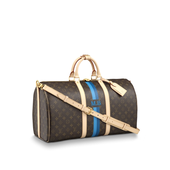 Woman showing off Louis Vuitton Keepall 50 Bandouliere My LV Heritage at an outlet sale.