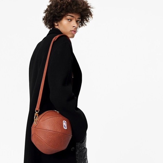 Get an original Louis Vuitton LVxNBA ball in a basket for the man in your life.