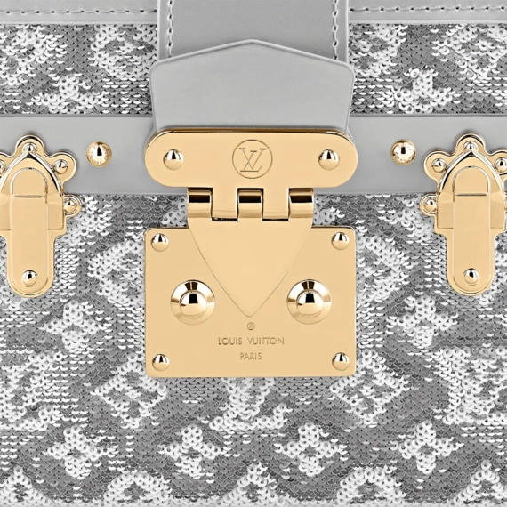 Presenting the Petite Malle by Louis Vuitton - An Iconic Bag for All Occasions.