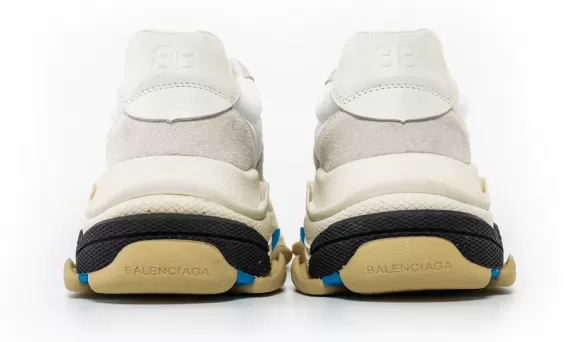 Upgrade your wardrobe with the Balenciaga Triple S Trainer White / Blue / Black for women on sale now!