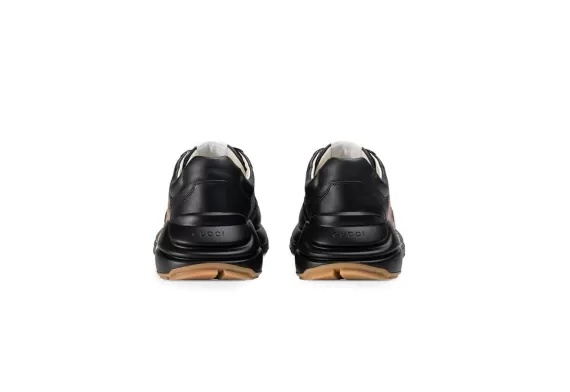 Shop men's Gucci Rhyton leather sneaker with tiger - Black at our outlet