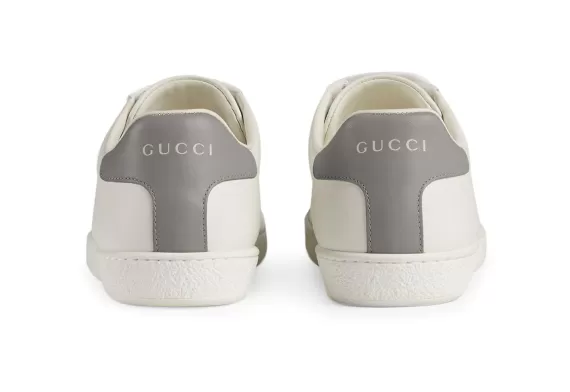 Look stylish with the Gucci Ace low-top sneakers featuring the White/grey Interlocking G symbol. Shop now!