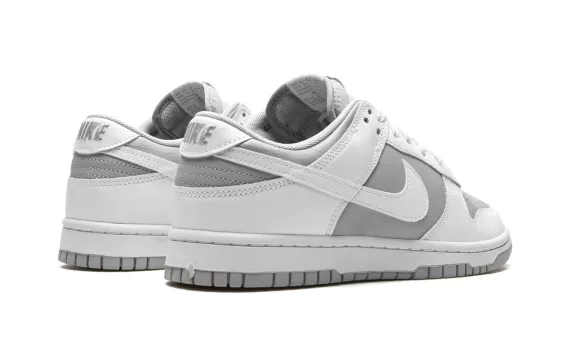 Take Home the Timeless Nike Dunk Low - White / Grey Women's Sneaker!