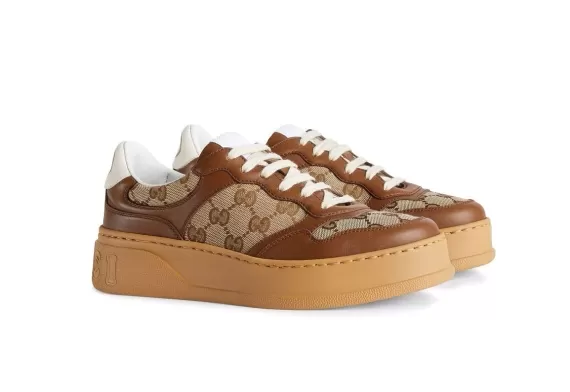 Buy the latest Women's Gucci GG embossed low-top sneakers in Ebony-beige today!