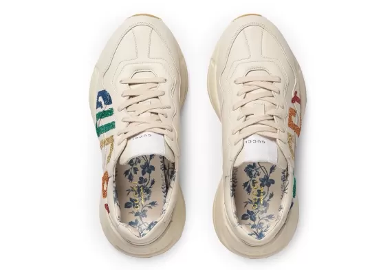 Women, shine in Rainbow Glitter Gucci leather sneaker from original Gucci Rhyton Outlet.