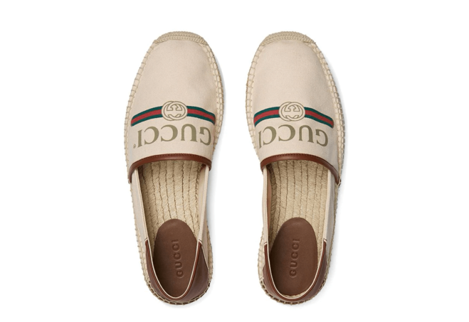 Catch the newest edition of the Gucci Logo Canvas Espadrille, now for men!