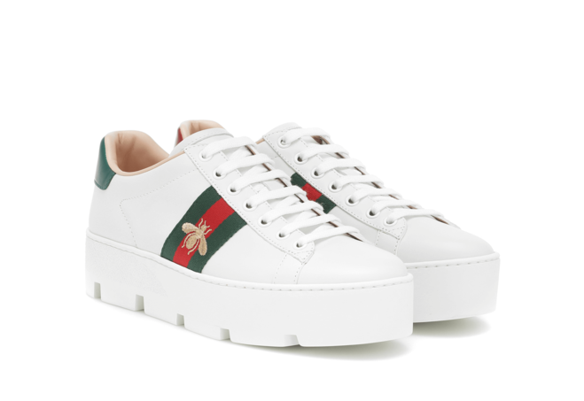 Shop Outlet Prices on Women's Gucci Ace Embroidered Platform Sneakers.