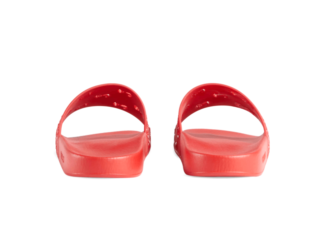 Alt Text: Transform your style with the Gucci Rubber GG Slide Sandal from the outlet!