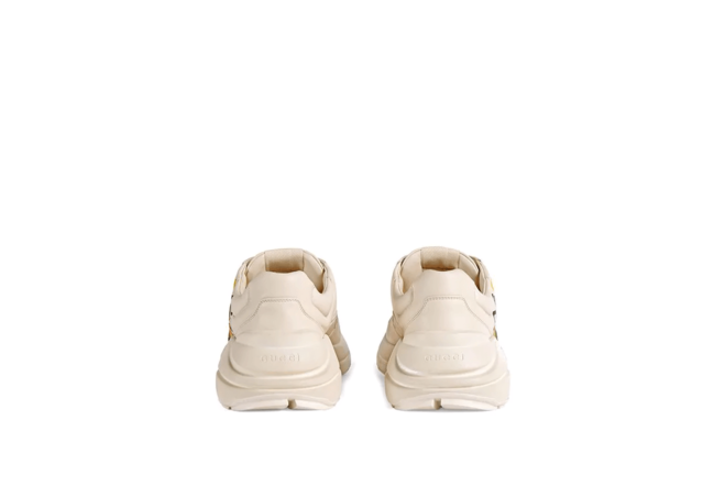 Perfect for the fashion-conscious man: Gucci Ivory Rhyton Logo Leather Sneakers - original items