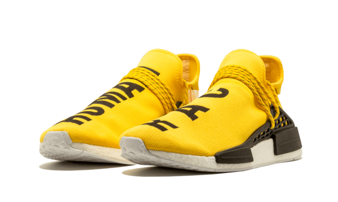 Get stylish with Pharrell Williams NMD Human Race yellow footwear for men from Original