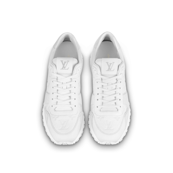 Women, Get Ready to Run Away with the Louis Vuitton White, Monogram-Embossed Grained Sneaker.